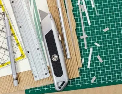 Cutting paper with a box cutter